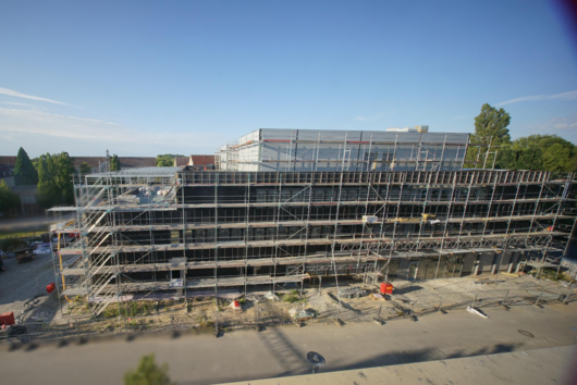 Exterior shot of a large building under construction
